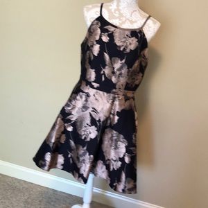 XSCAPE womens dress. Navy and metallic floral print. Lined with tulle skirt.